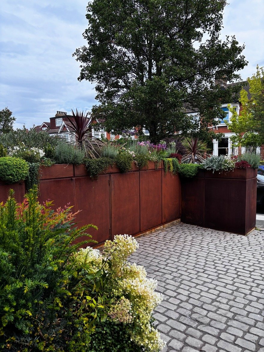 BikeBox: Bike-Storing Garden Planters - Core77