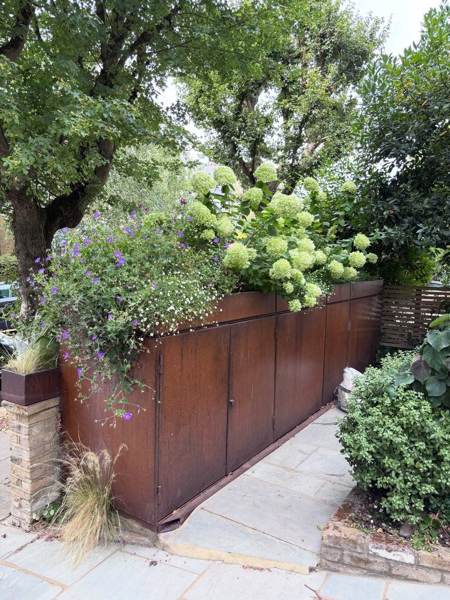 BikeBox: Bike-Storing Garden Planters - Core77
