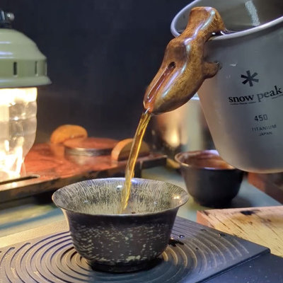 A Clever Add-On Spout for Camping Vessels
